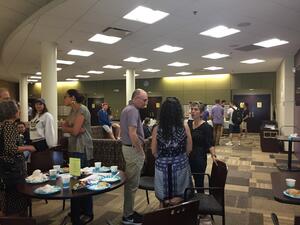 people gathered at the bagel brunch